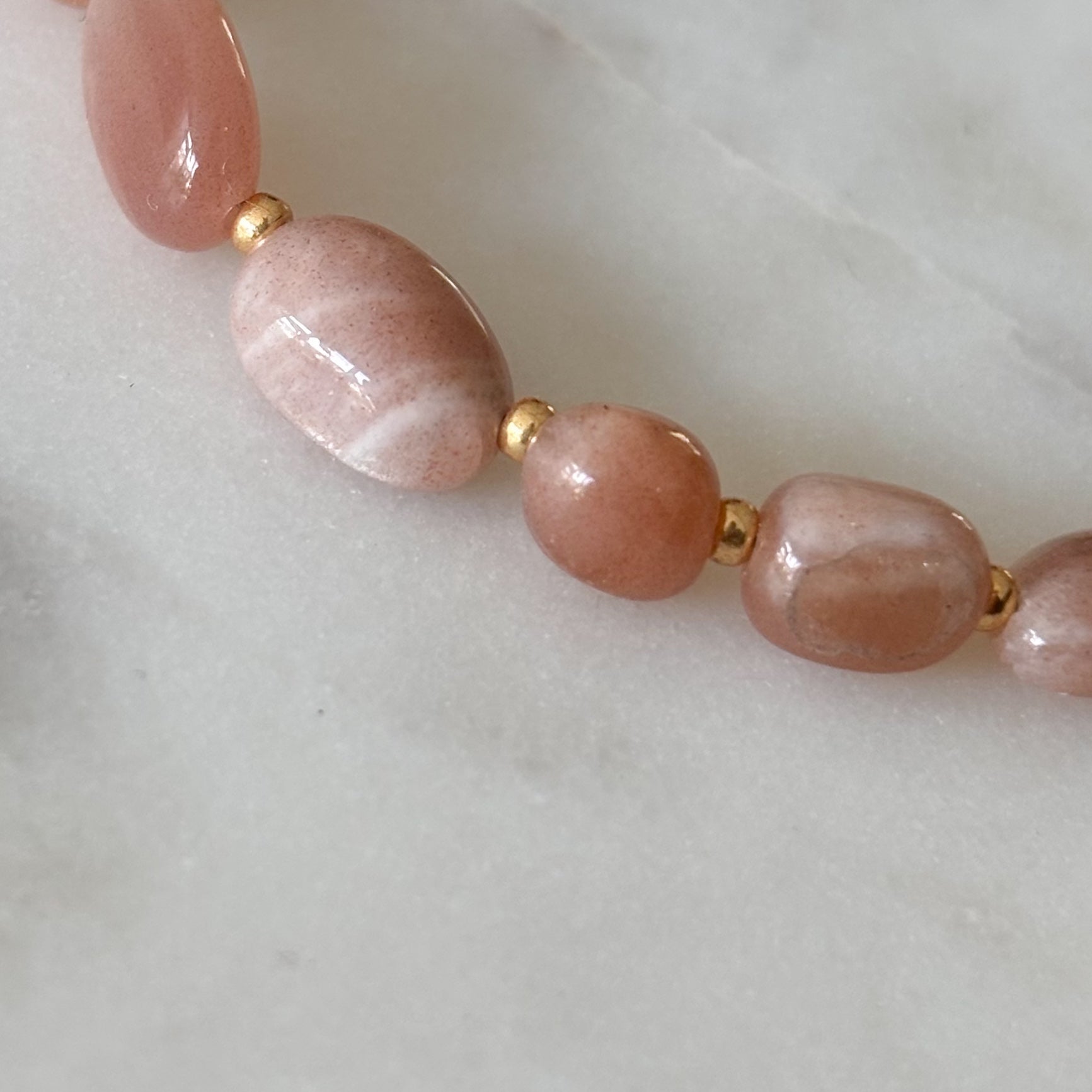 Roze steentjes met glitter armband 