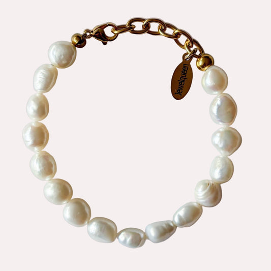 Goud rvs armband met grote witte parels 