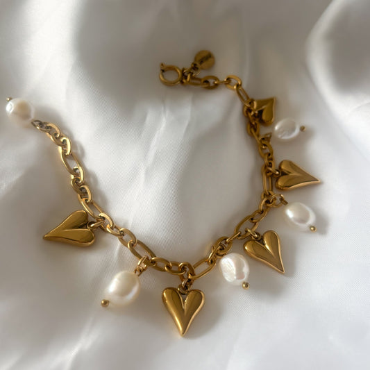 Stainless steel armband met hartjes en parels