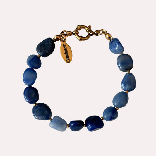 rvs gouden kralen armband met blauwe steentjes